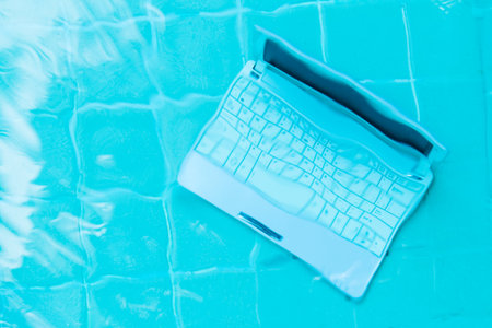Minicomputer at the bottom of the pool. The concept of a lot of work at work. Blur abstract background.の写真素材