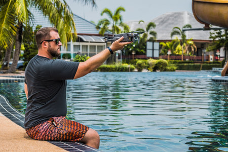 a man launches a drone for flight, with which you can take photos and video filming