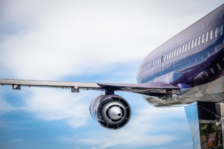 Plane flying in the sky. Transportation and travel.の写真素材