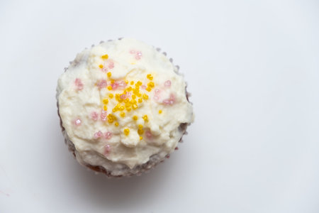 Cake. Cup cake on white table, on white background.の写真素材