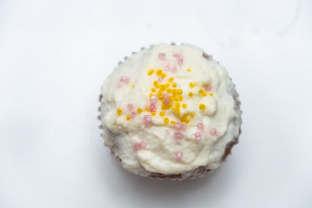 Cake. Cup cake on white table, on white background.の写真素材