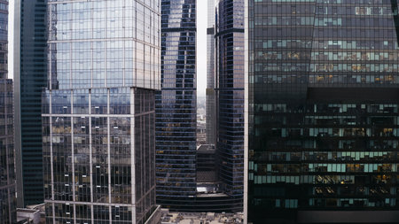 Glass and concrete skyscrapers, business centers. aerial flight.の写真素材
