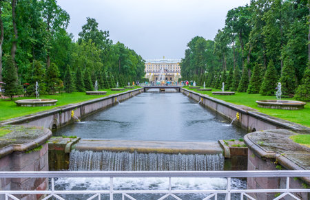 RUSSIA, Peterhof - JULY, 17, 2013. Large Canal with fountain mascarons in the lower parkのeditorial素材