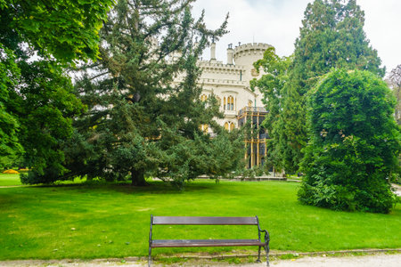 Czech Republic, Hluboka nad Vltavou - September 21, 2017. A bench in the park of HlubokÃ¡ Castle in the Czech Republic. Czech Windsor. Medieval fortress. Castle of Schwarzenbergのeditorial素材