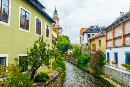 Brightly painted houses on the Vltava river in Cesky Krumlov in the Czech Republicの写真素材