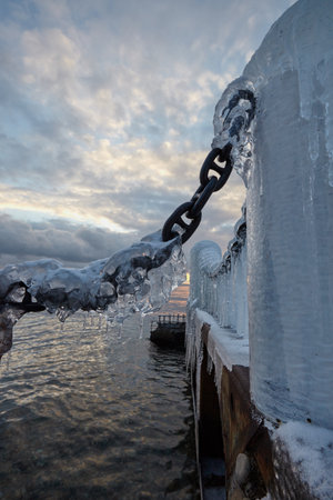 evening pier in ice