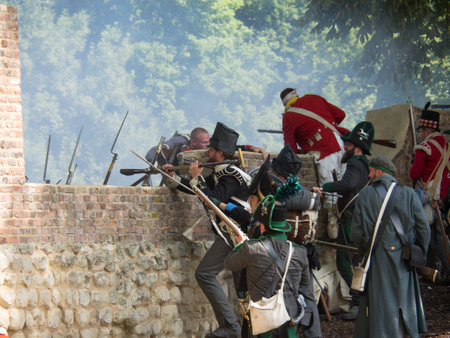 Waterloo, Belgium - June 18 2017: People re-enacting the siege of Hougoumont during the battle of...