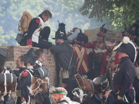 Waterloo, Belgium - June 18 2017: People re-enacting the siege of Hougoumont during the battle of...