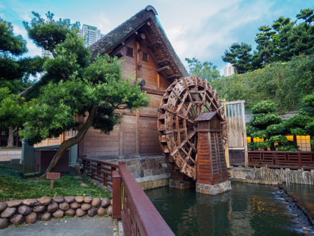 Kowloon, Hong Kong - November 3 2017: The old water mill, to be seen in the Nan Lian Garden in Hong Kong.のeditorial素材