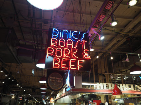 Philadelphia, USA - June 11, 2019: Image of the neon signs that can be found near the different stores in the Reading Terminal Market in Philadelphia.のeditorial素材