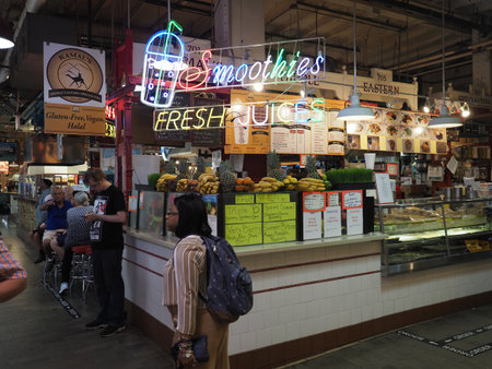 Philadelphia, USA - June 11, 2019: Image of the neon signs that can be found near the different stores in the Reading Terminal Market in Philadelphia.のeditorial素材