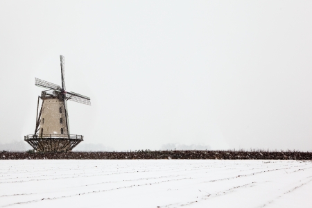 windmill and landscape in snowの写真素材