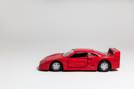 on white whit an toy car