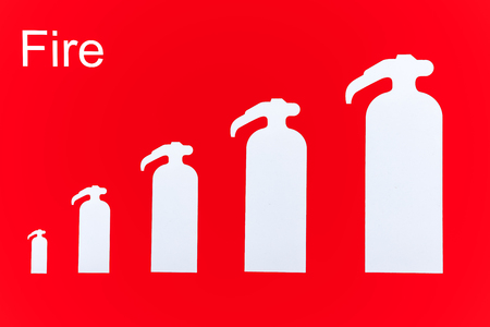 symbol of fire extinguishers on the wallの写真素材