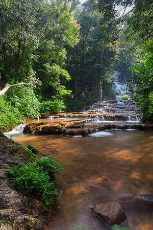 in the mounten of thailand there is an waterfallの写真素材