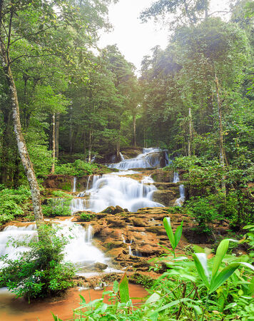 in the mounten of thailand there is an waterfallの写真素材