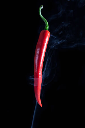 red chilli peper whit background black isolateの写真素材