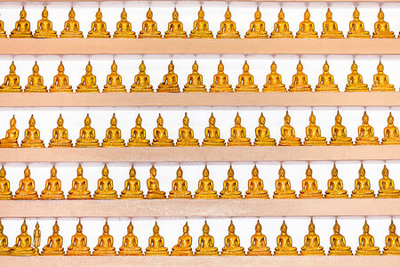 an lot of Buddha's in the Thai templeの写真素材