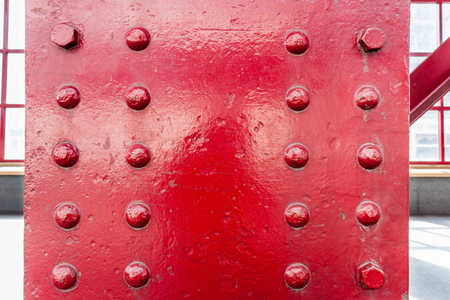 iron pole with clinker nails at the train stationの写真素材