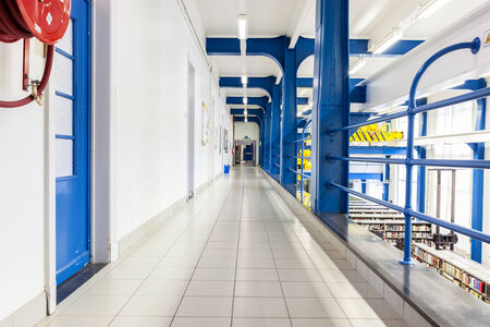 a long corridor in large building with cascading passethの写真素材