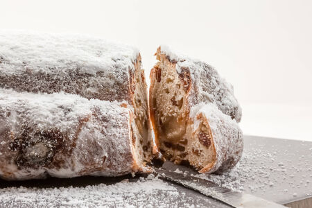 Traditional German Christmas cake. Stollen. Selective focus.