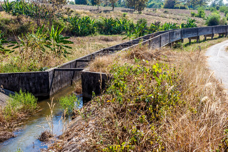 In Thailand, there is a stream of Aqueduct for the irrigation of the fieldsの写真素材