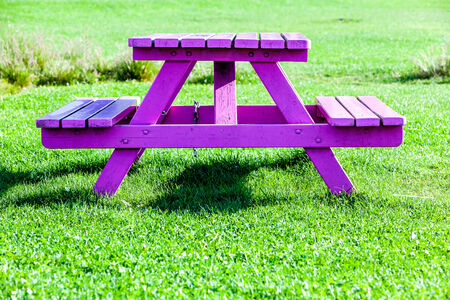 an old antique chair stands in the natureの写真素材