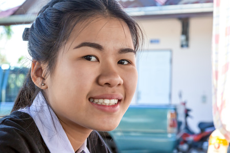 Charming woman Smile face close up in the streetの写真素材