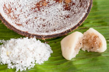 thai dessert made from coconut and steamed in a banana leafの写真素材