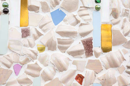 on this wall there are small pieces of tilesの写真素材