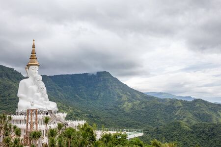In the mountains of Khao Klo is a new five white Buddha appearing close to each otherの写真素材