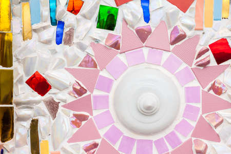 on this wall there are small pieces of tilesの写真素材