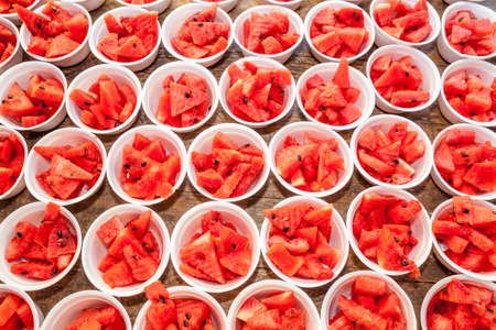 watermelon pieces in isomobox on the tableの写真素材
