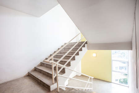 in an old building is located this beautiful staircaseの写真素材