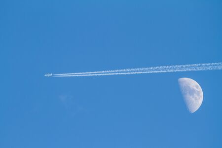 against the evening sky the crescent and stripes plane