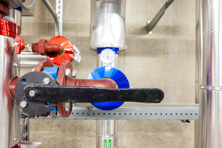 in an large building, there is an collector heating with an butterfly valve