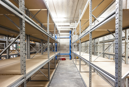 empty storage racks in a building with security