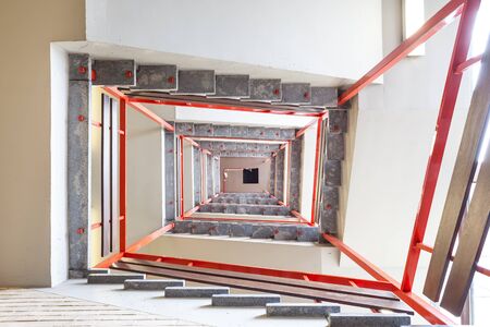 in an old building is located this beautiful staircase