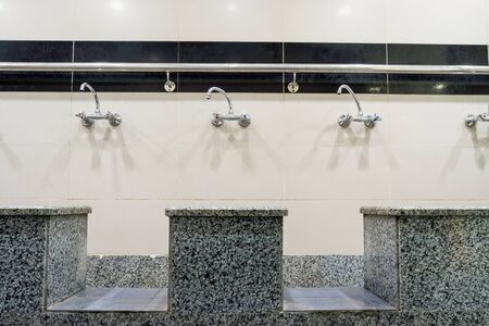 at the airport in a Muslim country, there is a bathroom for Muslims