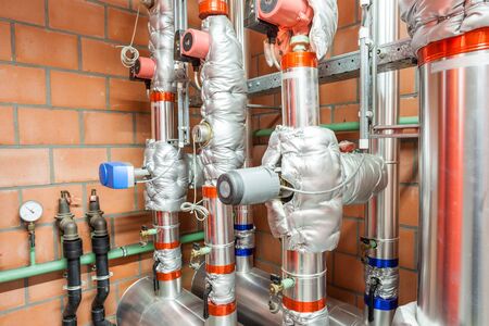 in the technical area, there are boosters for the water pipes of the buildingの写真素材