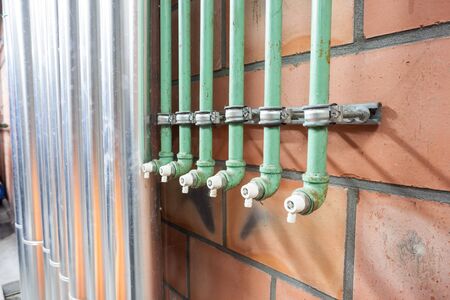 in the technical area, there are boosters for the water pipes of the buildingの写真素材