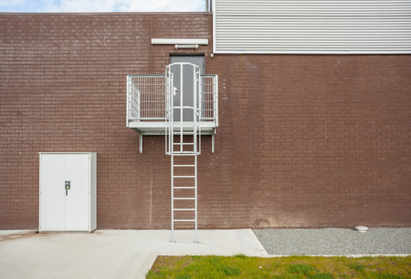 an tall building there is an emergency staircaseの写真素材