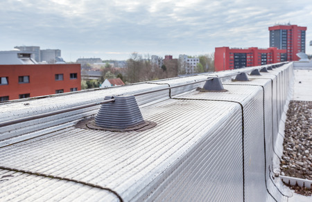 On an industrial building there is a lightning conductor on the roof