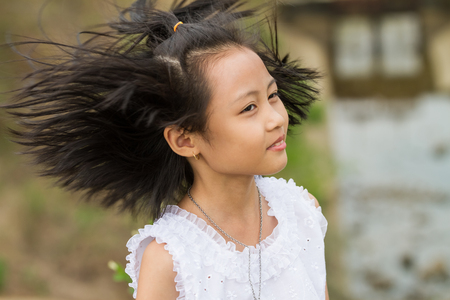 Thai girl play around whit traditional Thai costumeの写真素材
