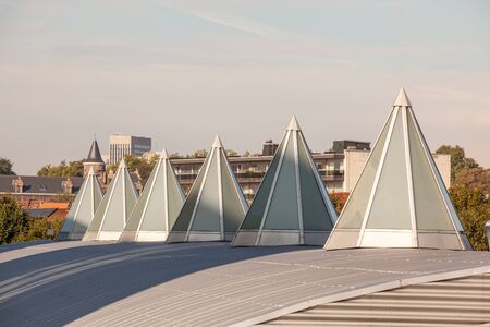 Plastic Dome in a row on a metal roofの写真素材