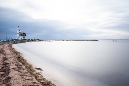 this beautiful lighthouse on a cloudy dayの写真素材
