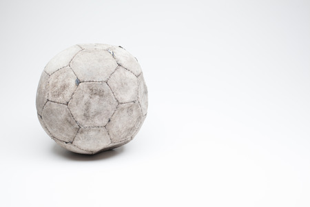 due to the overplaying, this leather football is worn out