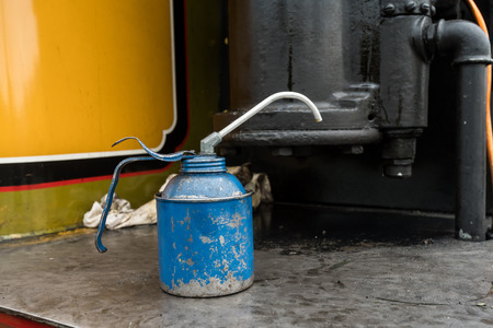 on an old steam train is this old oil canの写真素材