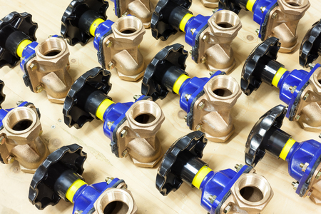 shut-off taps for hot and cold water, ready to be mounted on a work table