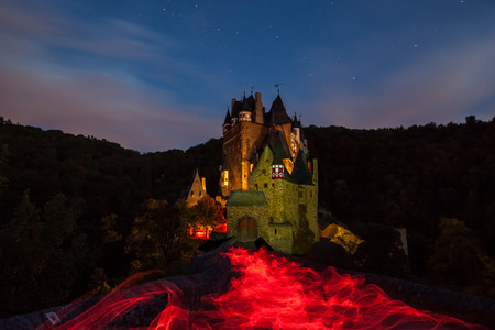 in the eve at the Eltz Castle with a beautiful evening light and starsのeditorial素材